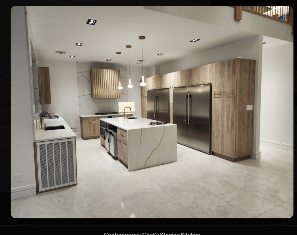 The OakRest House chef’s staging kitchen with dual full-sized refrigerators and marble island